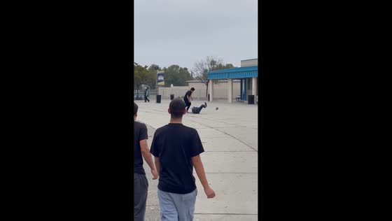 Playful football block leads to funny fall in California, USA
