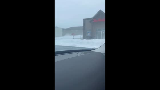 Heavy snowfall paralyzes streets and local businesses in Winnipeg, Canada