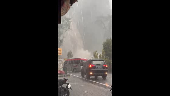 Rising water at Lembah Anai waterfall forces road closure in Tanah Datar, West Sumatra, Indonesia