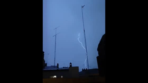 Lightning storm illuminates Barcelona skyline as severe thunderstorms hit Catalonia, Spain