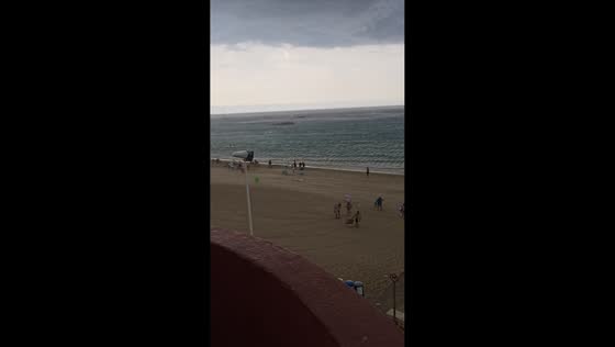 Powerful winds sweep beach equipment away during severe storm in Calpe, Spain