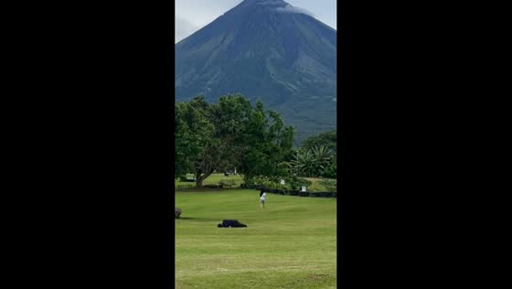 Boyfriend slips during running challenge near Mayon Volcano in Camalig, Philippines