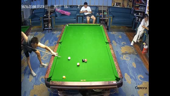Player clears billiard table before sinking the 8-ball in Shandong, China