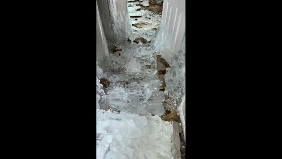 Heavy ice buildup inside home after frozen pipes burst in Pennsylvania, USA
