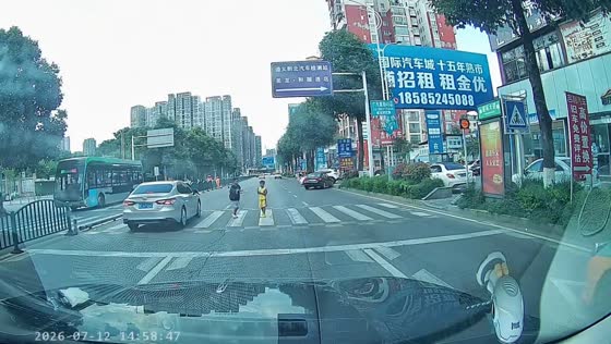 Boy narrowly avoids being hit while crossing road in Guizhou, China