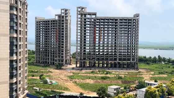 Controlled demolition brings down unfinished high-rise in Liaoning, China