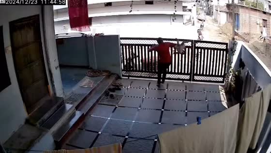 Father saves baby from falling in Hyderabad, India