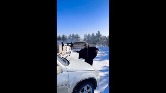 Man dances with car wiper as partner in Orenburg, Russia