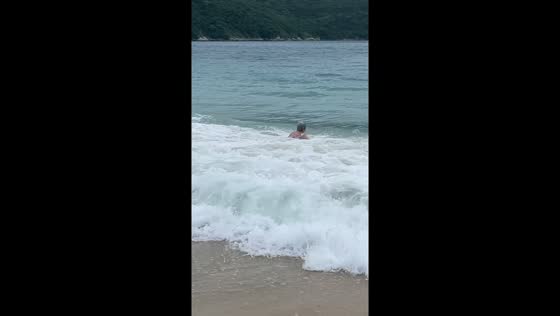 Brazilian grandma takes a wavy tumble in Rio!