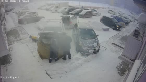 Parked car catches fire in residential courtyard in Kirovsky, Novosibirsk, Russia