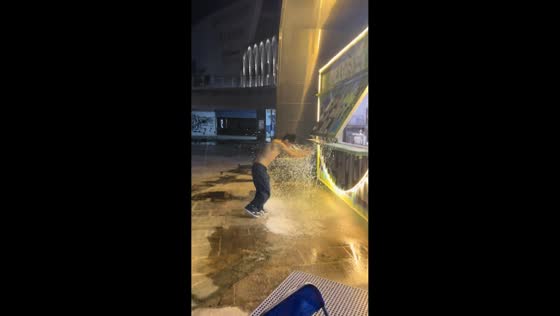 Man accidentally soaked while closing concession window in Guangdong, China