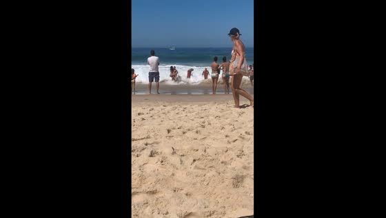Lifeguards brave rough waves to rescue drowning swimmer at Copacabana Beach