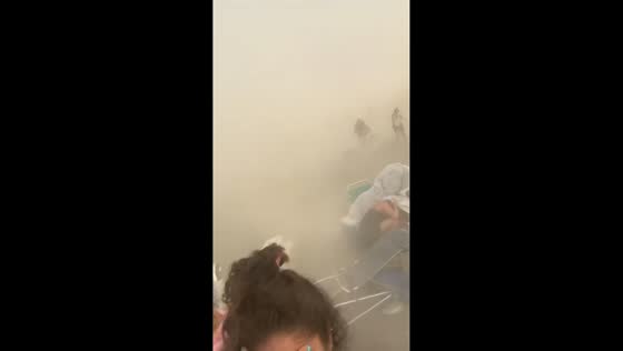 Tourists caught in unexpected “Satan’s Storm” at Playa Granada in Motril, Spain