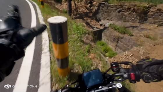 Motorcyclist falls into roadside hole and sits beside bike in Shandong, China