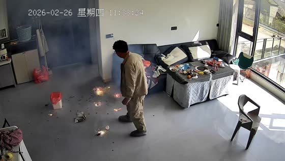 Man intervenes after child ignites firecrackers indoors in Guizhou, China