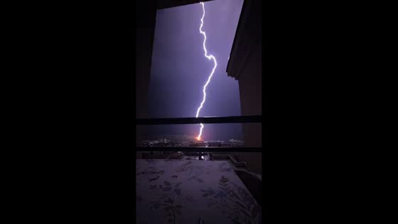 Lightning strike sparks fire during nighttime storm in Makarska, Croatia