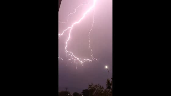 Lightning illuminates night sky during thunderstorm in Islamabad, Pakistan
