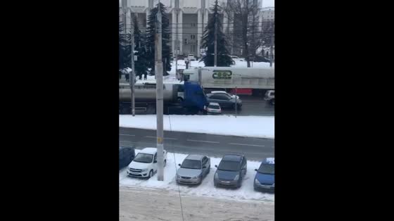 An unaware truck driver dragged the car for about 150 meters