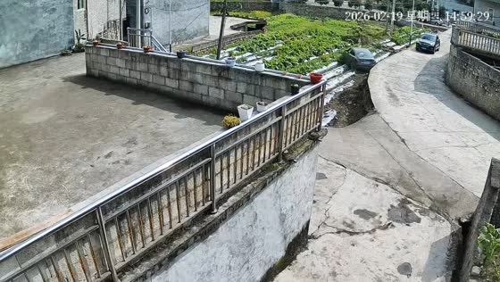 Sedan veers off winding rural road and into roadside ditch in Guangdong, China