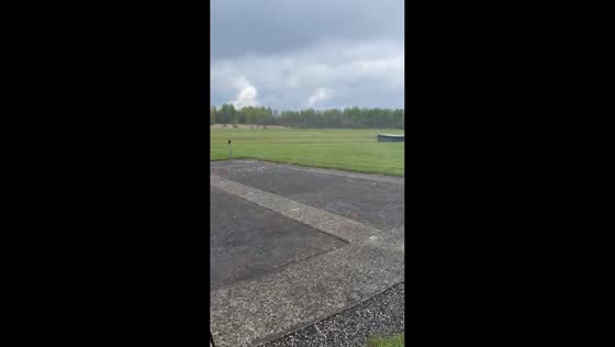 Light hail falls during cloudy weather in Bridgeport, New York