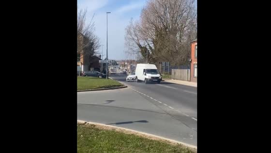 Van rams police car in Salford, England