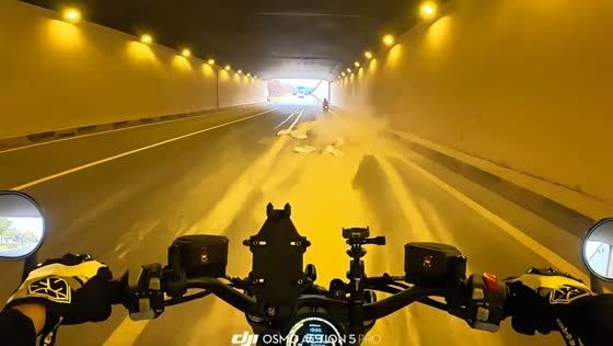 Motorcyclist slips on debris in Chongqing, China