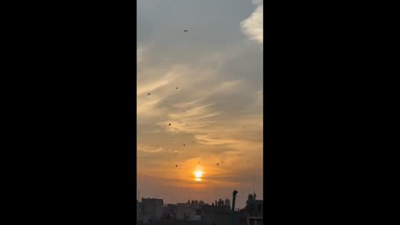 Kites fill evening sky during Basant festival in Baghbanpura, Lahore, Pakistan