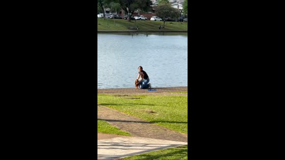 Woman rescues her dog from a river in Guarapuava, Brazil