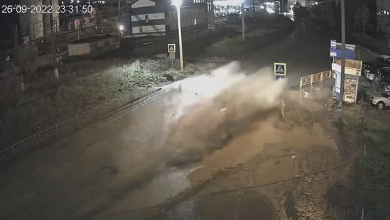 Hidden hole beneath puddle causes car accident in Ust-Kuta, Russia
