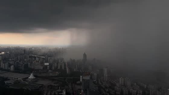 Microburst and cloudburst engulf skyline during thunderstorm in Nanning, Guangxi, China