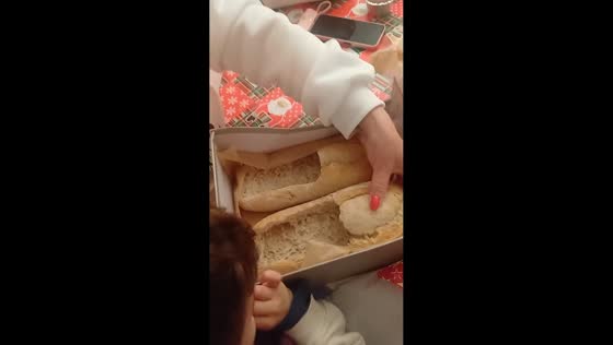 Man gives bread-shaped shoe as Christmas prank in Lisbon, Portugal