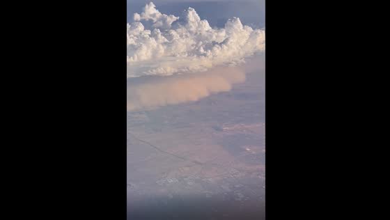 Mesmerizing aerial encounter: epic dust storm sweeps towards Phoenix, Arizona
