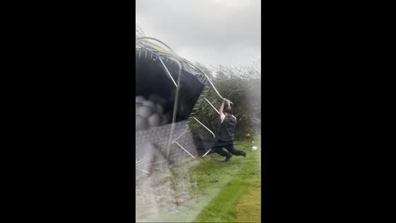 Man rescues trampoline during storm in Bute, Scotland, UK