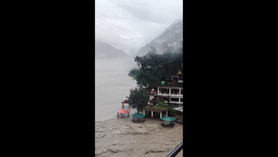 Swollen Alaknanda and Pinder rivers surge through Karnprayag, India