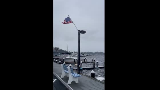 Windy day by the sea: strong winds and swaying boats in Pine Beach, New Jersey