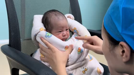 Pouting baby reacts to playful scolding in Henan, China
