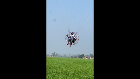 Paragliding flower drop at religious ceremony in Gurdaspur