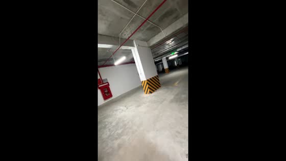 Airbnb hallway leads to surprise parking garage view in Hue City, Vietnam