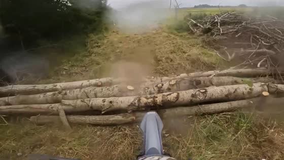Teen rider tumbles from dirt bike while crossing log obstacle in Koszalin, Poland