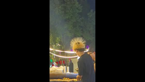 Static hair stands during barbecue in Fujian Province, China