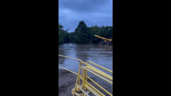 Floodwaters rush through Wisconsin Ave in Wauwatosa, Wisconsin , USA