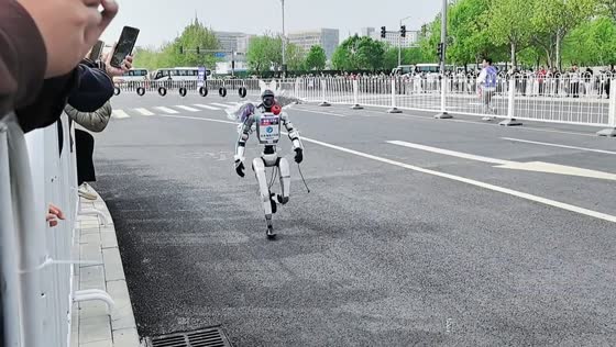 Humanoid robot veers off course during Beijing robot half marathon in China