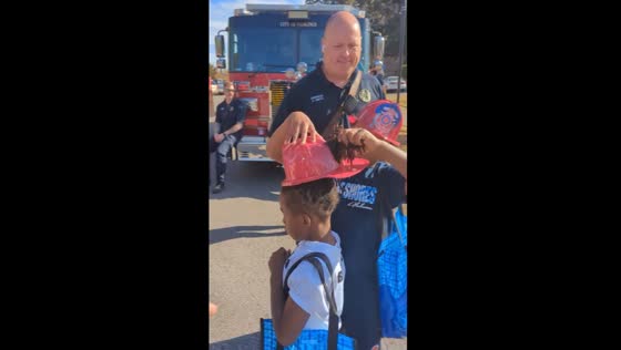 Firefighter's heartwarming gesture: a helmet fit for every hero
