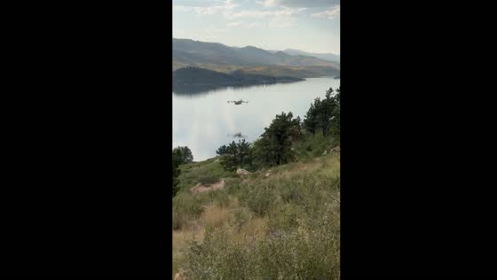 Aircraft draw water from Horsetooth Reservoir to combat Alexander Mountain fire in Colorado