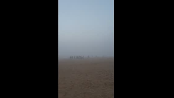 Fog blankets Valencia's Cabanyal Beach in daylight mystery