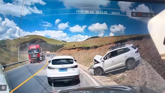 Overtaking car crashes into oncoming truck in Xinduqiao, China