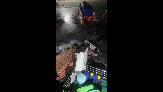 Truck struggles to unload from ship in Occidental Mindoro, Philippines