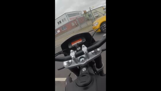 Failed wheelie: motorcyclist brushes off fall and rides on