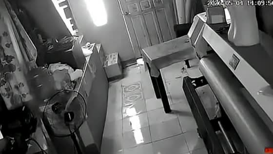 Woman rushes to grab child during earthquake in Basey, Samar, Philippines