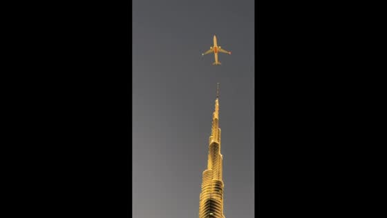 Plane appears to fly very close to Burj Khalifa in Dubai, UAE